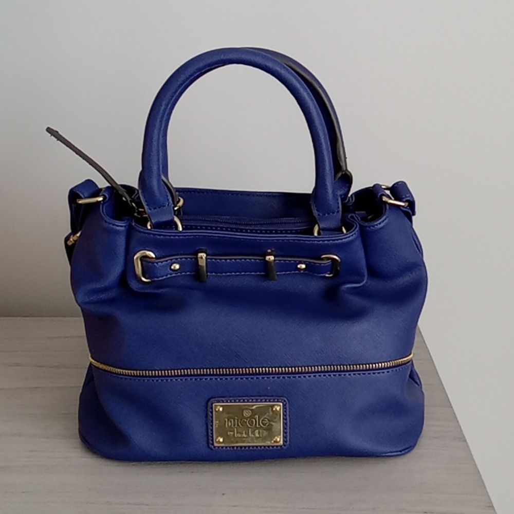 Handbag with crossbody strap